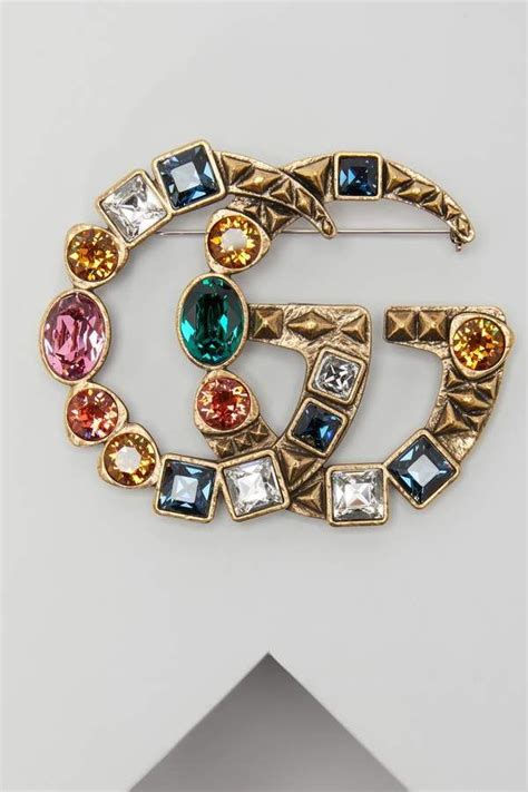 gucci brooch pins.